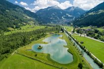 Der Gasteiner Badesee in Bad Hofgastein.  • © Gasteinertal Tourismus GmbH, Daniel Ausweger